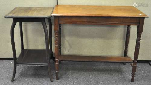 An Edwardian walnut side table, the rectangular top on turned legs with a shelf stretcher,