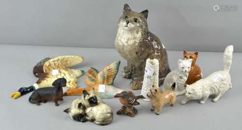 A collection of assorted animal figures including Beswick, Doulton and Beleek,