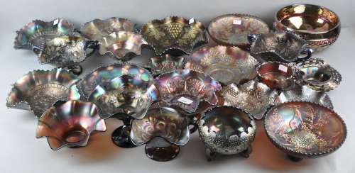 An extensive collection of assorted carnival glass, mostly bowls and dishes,