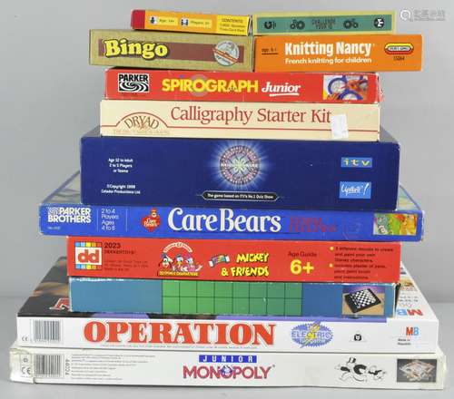 A collection of games, to include Junior Monopoly, Operation,