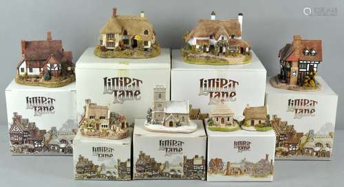 A group of seven boxed Lilliput Lane buildings,