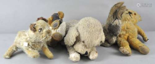A collection of four vintage golden mohair teddies,