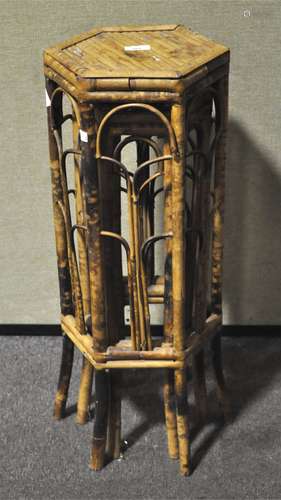 A pair of bamboo plant stands,