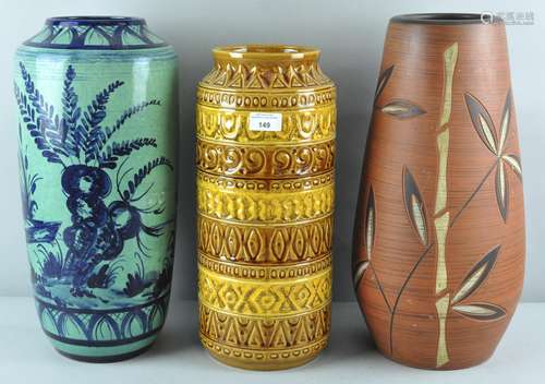 A collection of three assorted retro vintage West German pottery floor vases,