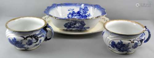 A Doulton Burslem Gloire/de dijon pattern toilet set comprising wash bowl and two chamber pots,