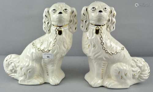 Two 20th century continental Staffordshire dogs, with gilt decoration,