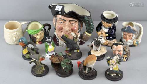 A collection of Toby Jugs and bird figures, including Royal Doulton 'Mine Host' Toby jug, 18cm high,