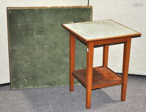 A folding oak card table,