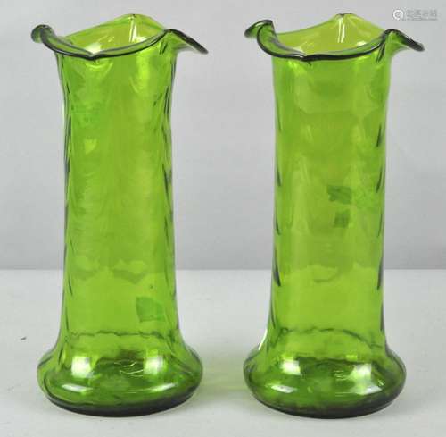 A pair of 19th century Art Nouveau green glass vases,