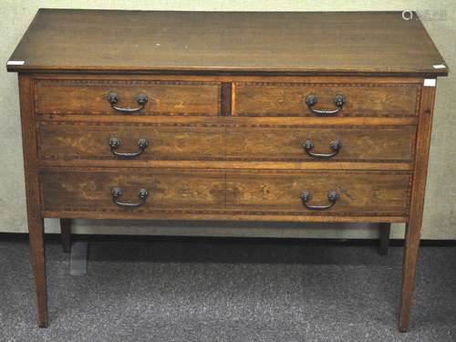 An Edwardian mahogany rectangular form dressing table set two short and two long drawers