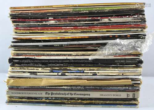 A collection of assorted vinyls, mostly rock, to include Fleetwood Mac, Mungo Jerry,