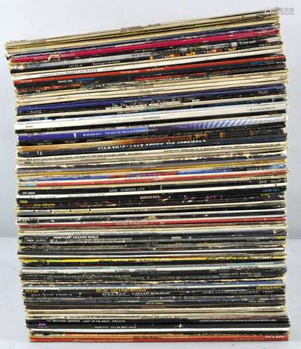 A collection of assorted vinyls, mostly rock, to include Slave, Prism,