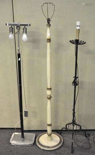 Two metal and one wooden standard lamp (3),