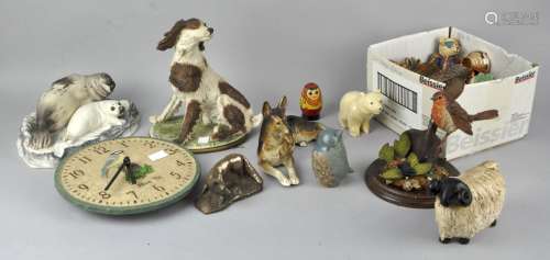A collection of assorted animals figures, to include a Boerim seal and pup, a sheep and dogs.