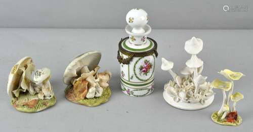 Four porcelain funghi sculptures, 11cm high; and a 19th century ormulu mounted scent bottle,