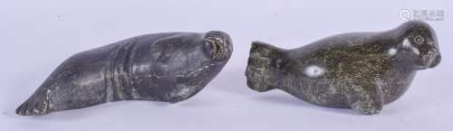 TWO NORTH AMERICAN INUIT CARVED NAUJAT CO SOAPSTONE SEALS. Largest 12 cm wide. (2)