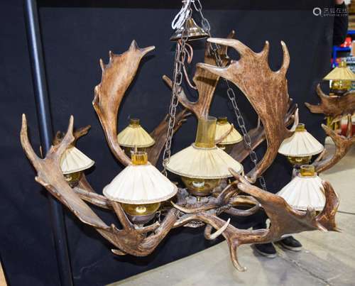 A LARGE 19TH CENTURY BAVARIAN BLACK FOREST ANTLER HORN CHANDELIER of naturalistic form. 94 cm x 60 c