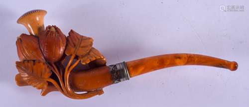 A 19TH CENTURY CARVED MEERSCHAUM AND AMBER PIPE formed as vines and leaves. 16.5 cm wide.