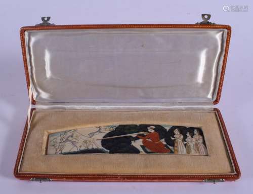 A RARE BOXED 19TH CENTURY PAINTED PERSIAN IVORY MINIATURE painted with figures hunting within landsc