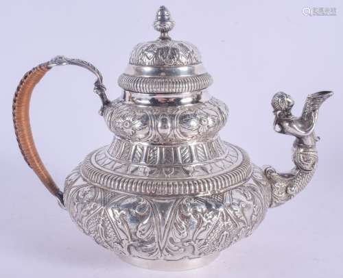 A 19TH CENTURY DUTCH SILVER TEAPOT AND COVER possibly after an 18th century design by Jan De Vries (