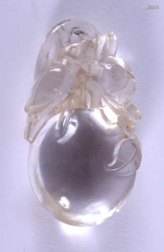 A 19TH CENTURY CHINESE CARVED ROCK CRYSTAL PENDANT Qing, formed as a bird amongst berries. 4.5 cm x