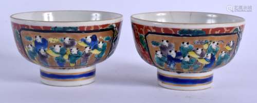 A PAIR OF 19TH CENTURY JAPANESE MEIJI PERIOD AO KUTANI TEABOWLS painted with figures and landscapes.