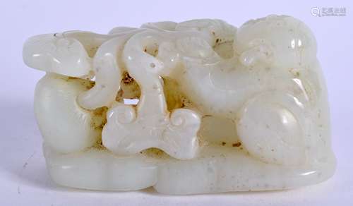 A CHINESE CARVED WHITE JADE FIGURE OF A BOY 20th Century, modelled clutching at a lingzhi fungus. 8