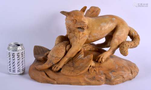 A RARE LARGE 19TH CENTURY ITALIAN GRAND TOUR CARVED SIENNA MARBLE FOX modelled resting over a fallen