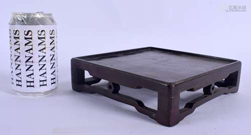 A 19TH CENTURY CHINESE CARVED HARDWOOD SQUARE FORM STAND Qing, possibly Zitan. 18 cm square.