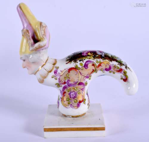 AN 18TH/19TH CENTURY CONTINENTAL PORCELAIN CANE HANDLE modelled in the Meissen style. 10 cm x 4.5 cm