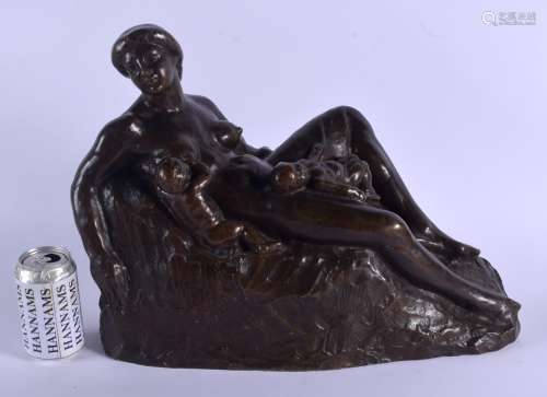 A VERY EARLY 1920S EUROPEAN BRONZE FIGURE OF A RECLINING LADY by S Jarey, modelled as a sleeping chi