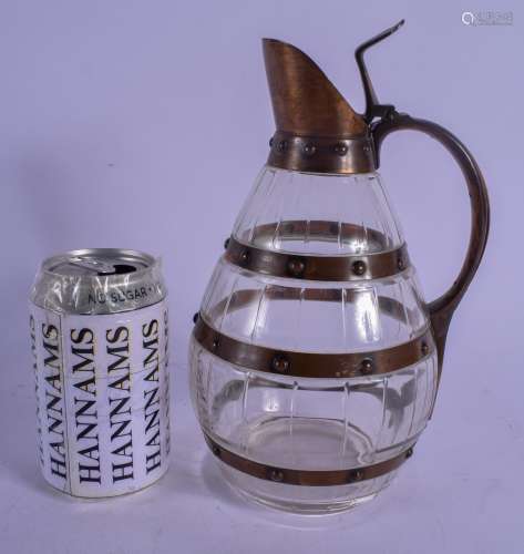 AN ARTS AND CRAFTS COPPER AND CRYSTAL GLASS WHISKEY DECANTER of barrel form. 24.5 cm high.