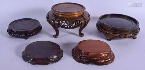 FIVE EARLY 20TH CENTURY JAPANESE MEIJI PERIOD HARDWOOD STANDS in various forms and sizes. Largest 16