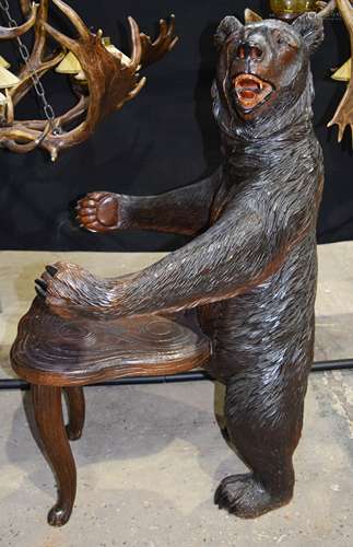 A VERY RARE 19TH CENTURY BAVARIAN BLACK FOREST CARVED WOOD CHAIR modelled as a standing brown bear w