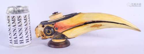 AN EXTREMELY RARE 19TH CENTURY CHINESE CARVED IVORY AND RHINOCEROS HORN HORNBILL SKULL Qing, with mo