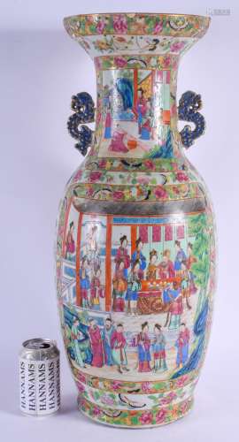 A LARGE 19TH CENTURY CHINESE CANTON FAMILLE ROSE VASE Qing, painted with figures before an official