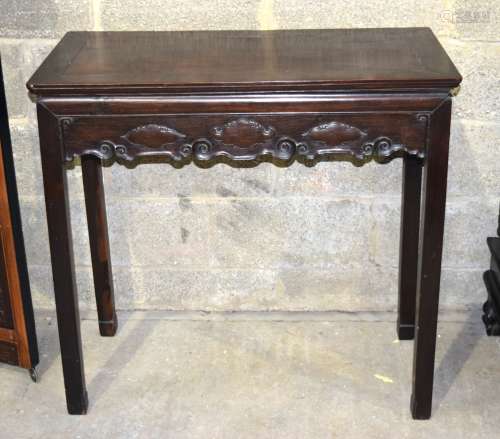 A 19TH CENTURY CHINESE HONGMU HARDWOOD RECTANGULAR ALTAR TABLE Qing, carved with central triple clou