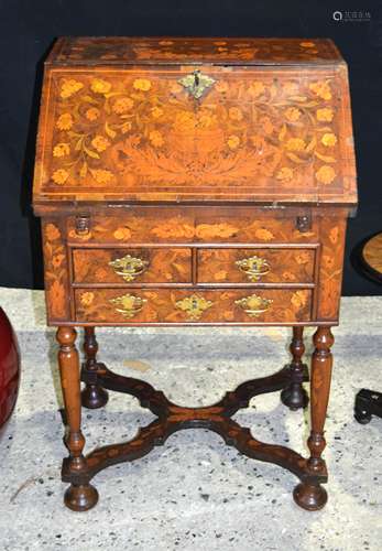 AN EARLY 18TH CENTURY DUTCH WALNUT AND FLORAL MARQUETRY VENEERED BUREAU ON STAND with fall front and