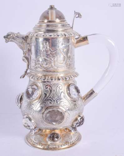 A RARE ARTS AND CRAFTS SILVER JEWELLED PRISM CUT JUG with beast spout, decorated with Viking boats a