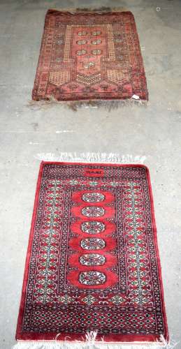 TWO PERSIAN RUGS. Largest 130 cm x 78 cm. (2)