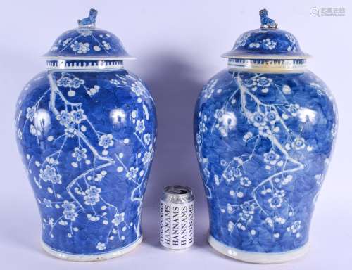 A LARGE PAIR OF 19TH CENTURY CHINESE BLUE AND WHITE PORCELAIN GINGER JARS AND COVERS Kangxi style, p