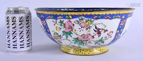 A LARGE 19TH CENTURY CHINESE CANTON ENAMEL CIRCULAR BOWL Qing, painted with figures, birds and flora