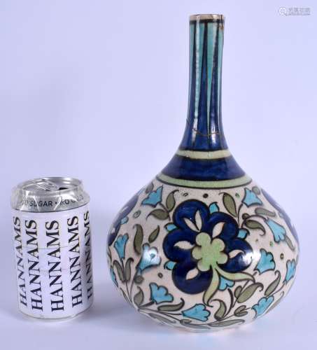 A BURMANTOFTS ARTS AND CRAFTS POTTERY VASE painted in the Persian style. 26 cm high.