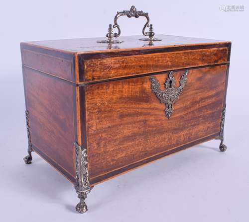 A GEORGE III MAHOGANY SILVER MOUNTED RECTANGULAR TEA CADDY overlaid with acanthus, the feet formed f