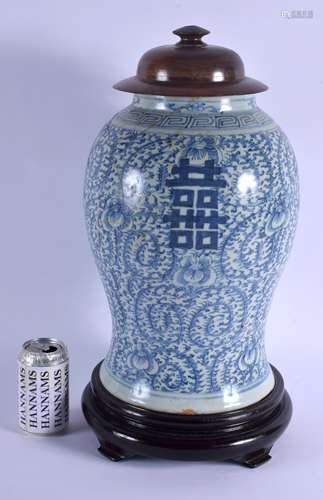 A LARGE 19TH CENTURY CHINESE BLUE AND WHITE BALUSTER VASE AND COVER Qing, painted with foliage. Vase