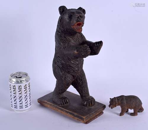 A LARGE EARLY 20TH CENTURY BAVARIAN BLACK FOREST CARVED BEAR together with another smaller bear. Lar