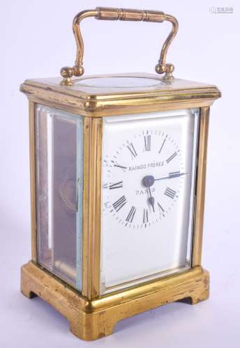 A FRENCH BRASS CARRIAGE CLOCK Raingo Freres Paris. 14 cm high inc handle.