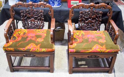 A LOVELY PAIR OF 19TH CENTURY CHINESE CARVED HONGMU HARDWOOD CHAIRS Qing, decorated with foliage and