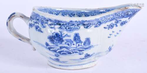 AN 18TH CENTURY CHINESE EXPORT BLUE AND WHITE PORCELAIN SAUCEBOAT Qianlong, painted with landscapes.