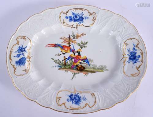 AN 18TH CENTURY MEISSEN PORCELAIN LEAF AND VINE MOULDED PORCELAIN DISH painted with exotic birds wit